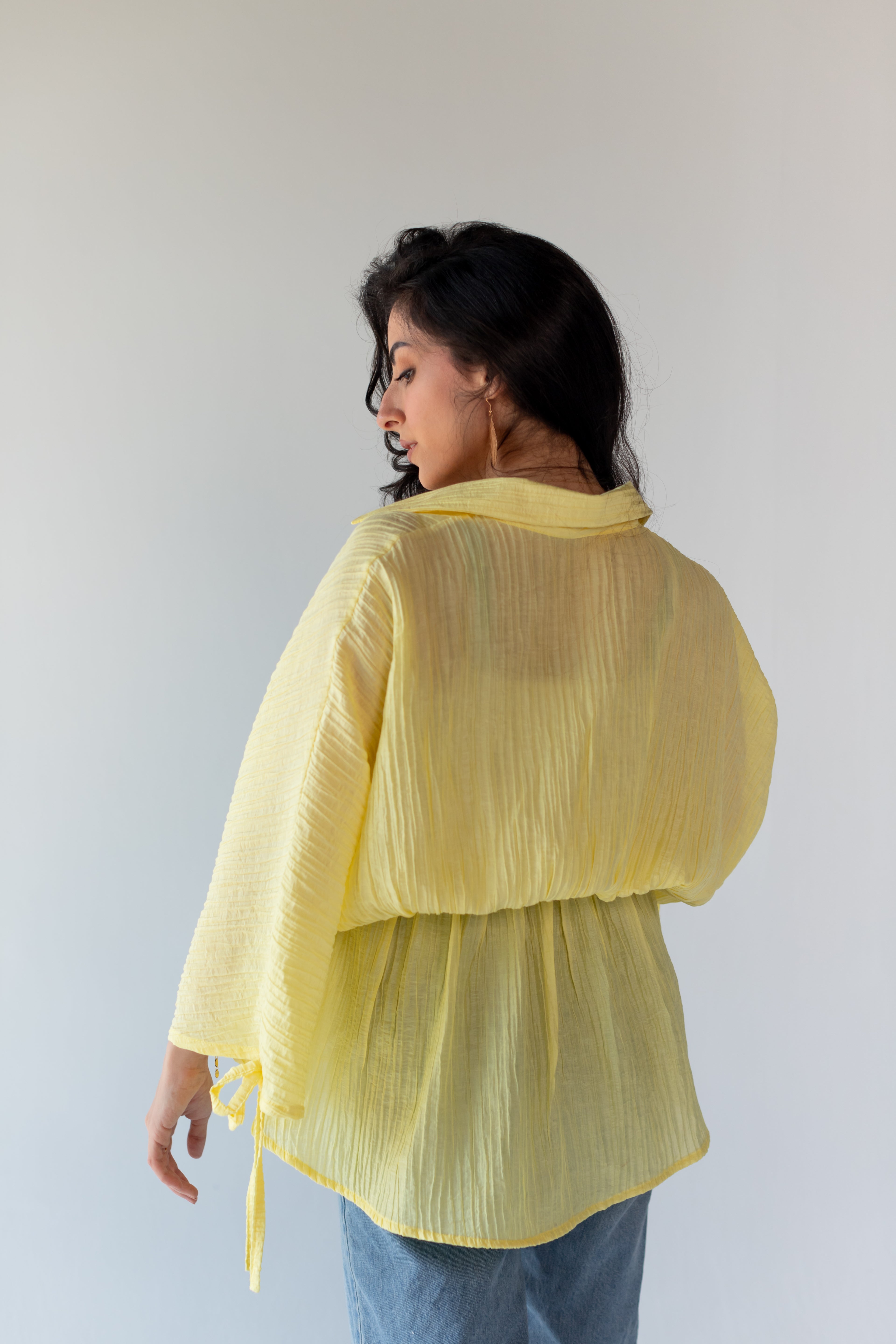 Yellow ruffle blouse
