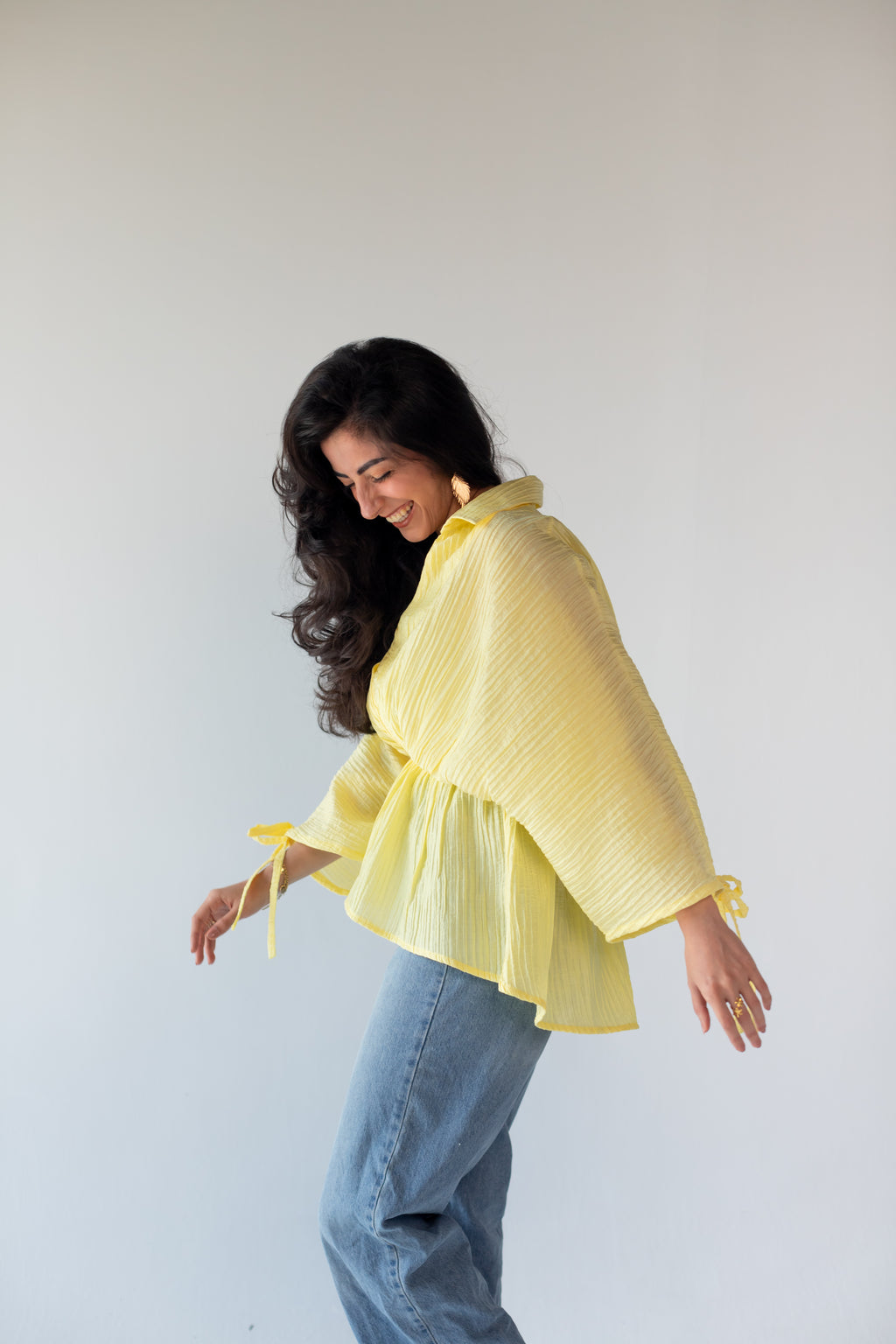 Yellow ruffle blouse