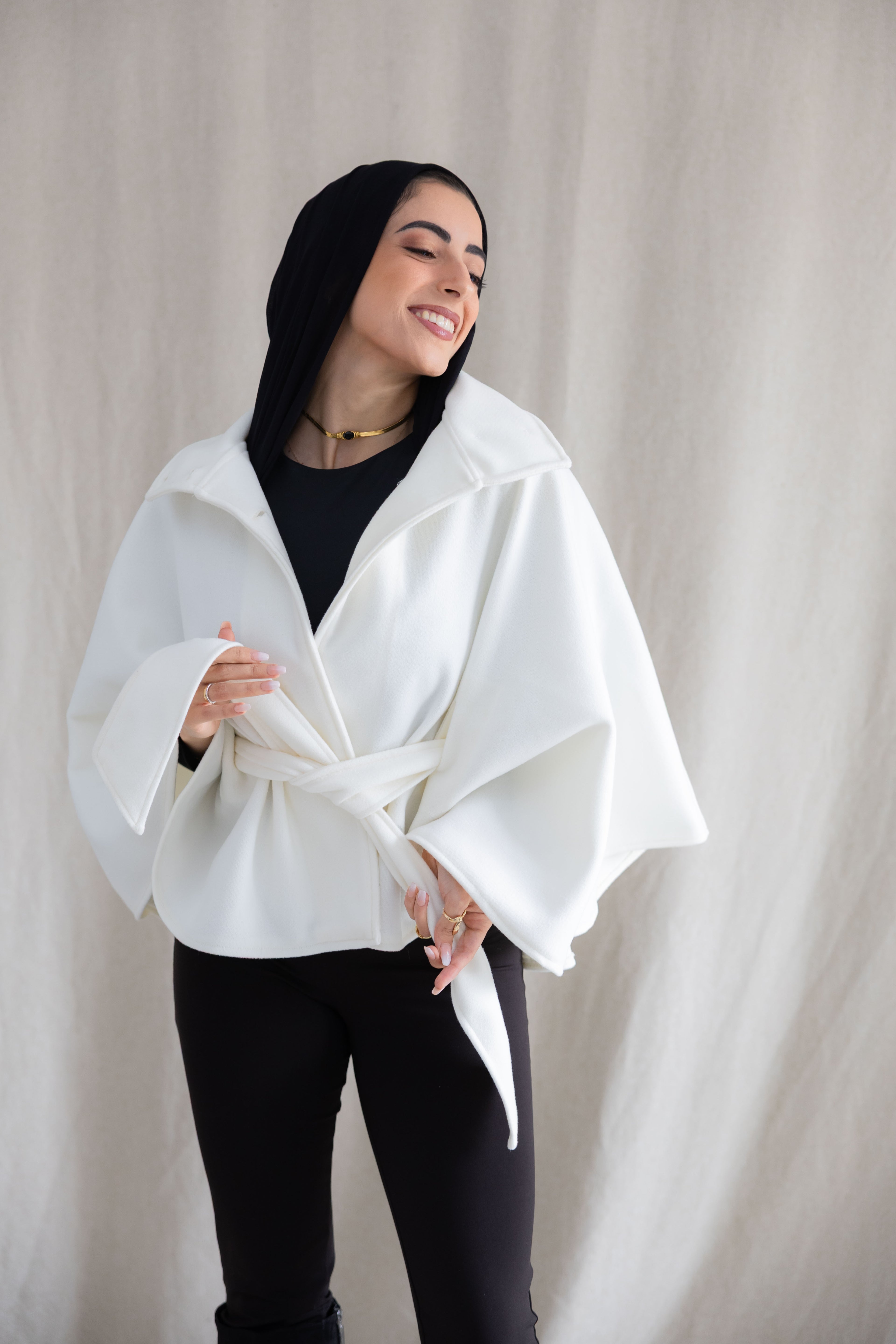 The white cape jacket
