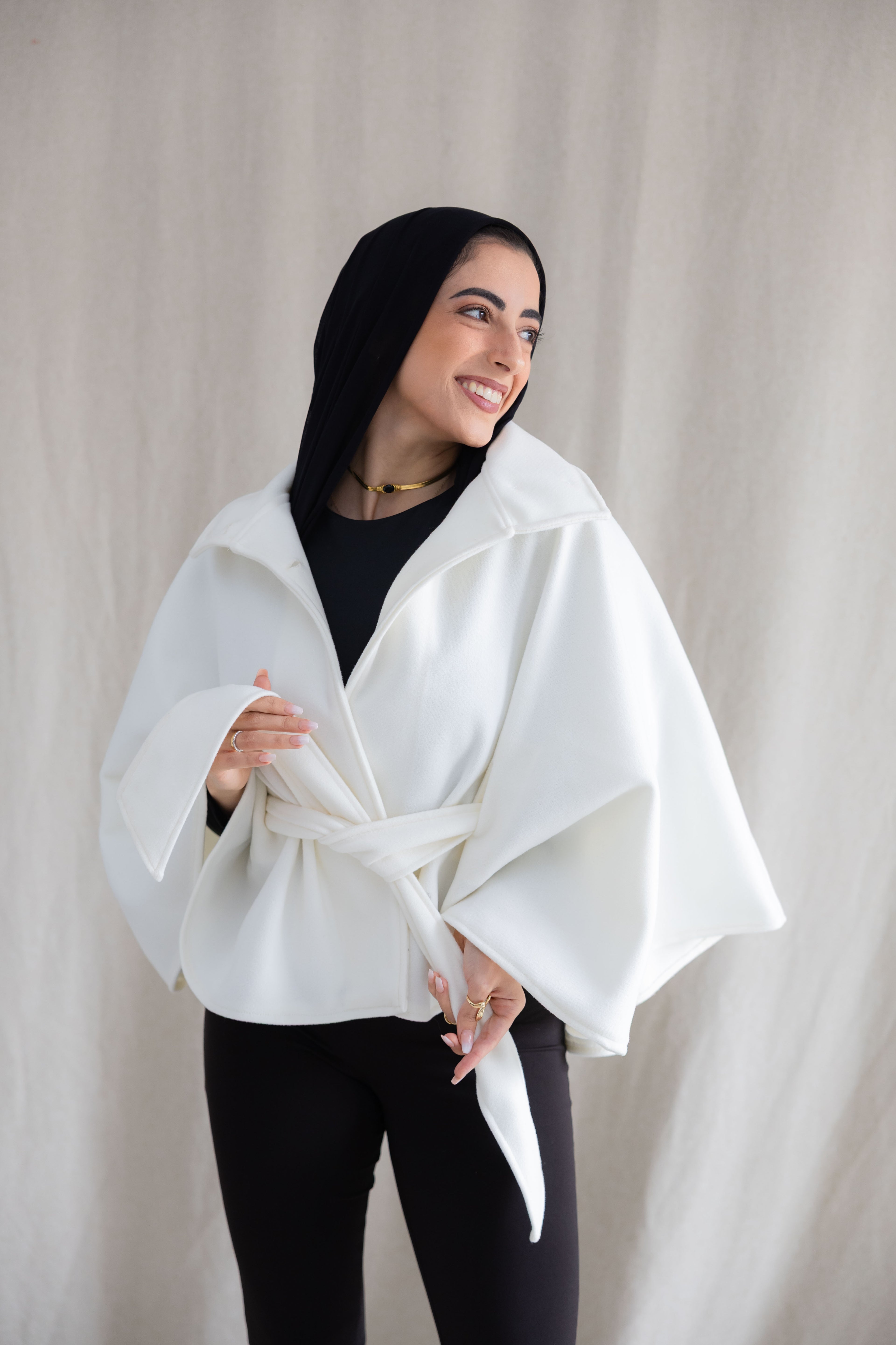 The white cape jacket